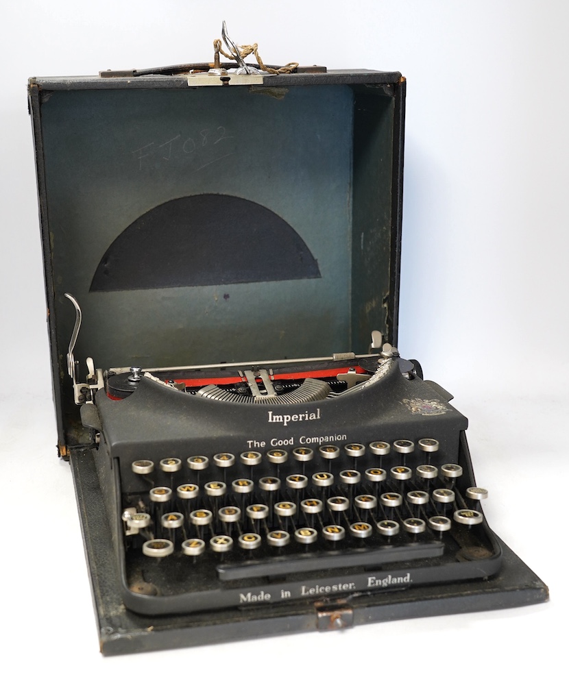 An Imperial portable typewriter, The Good Companion. Condition - poor to fair, some wear, minor damage and losses and surface rust to metal parts on the case